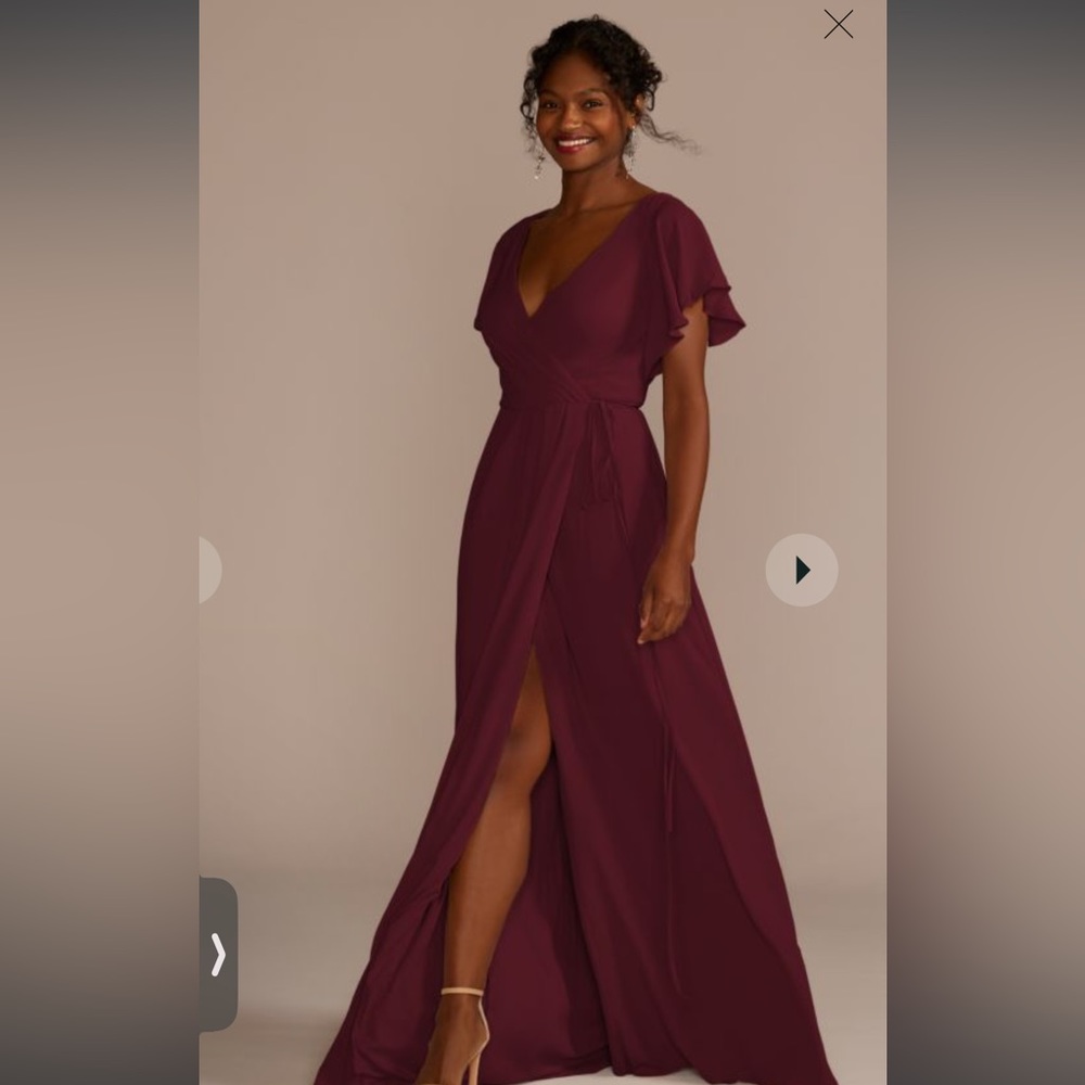 Flutter sleeves and pleats wrap around the bodice WINE color size 24